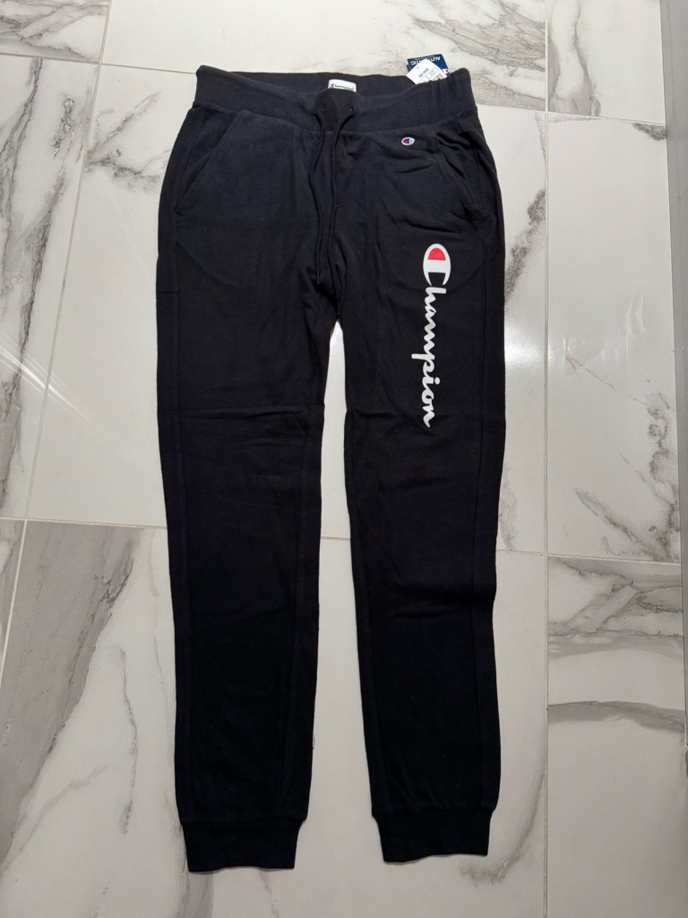 Champion  Black Sweatpants with White Script Logo and Red Accent
